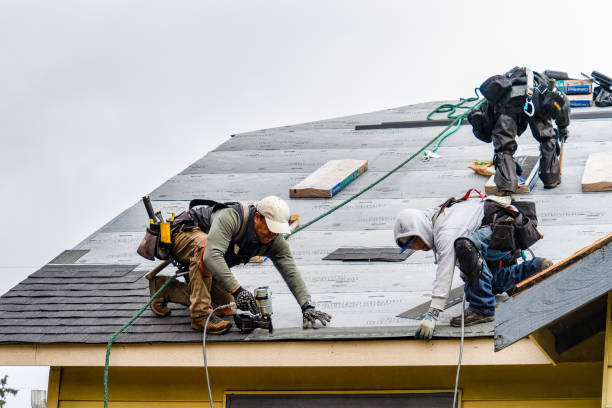 Professional Gutter Installation technician working in Sterling, KS